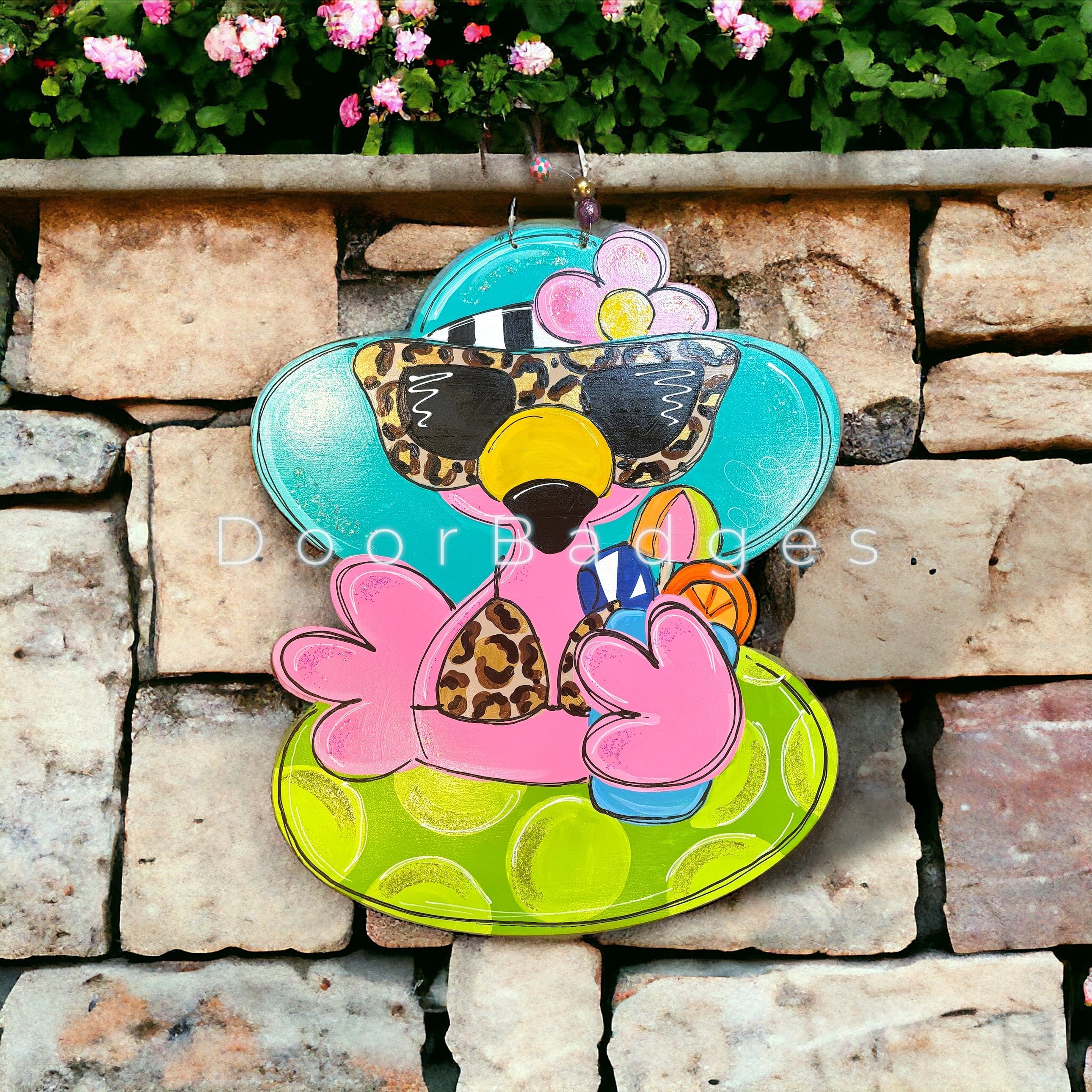 Flamingo on a float summer Door Hanger